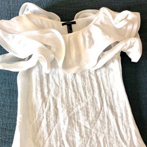 Darling ruffle top in a crinkle type fabric. New with tags.